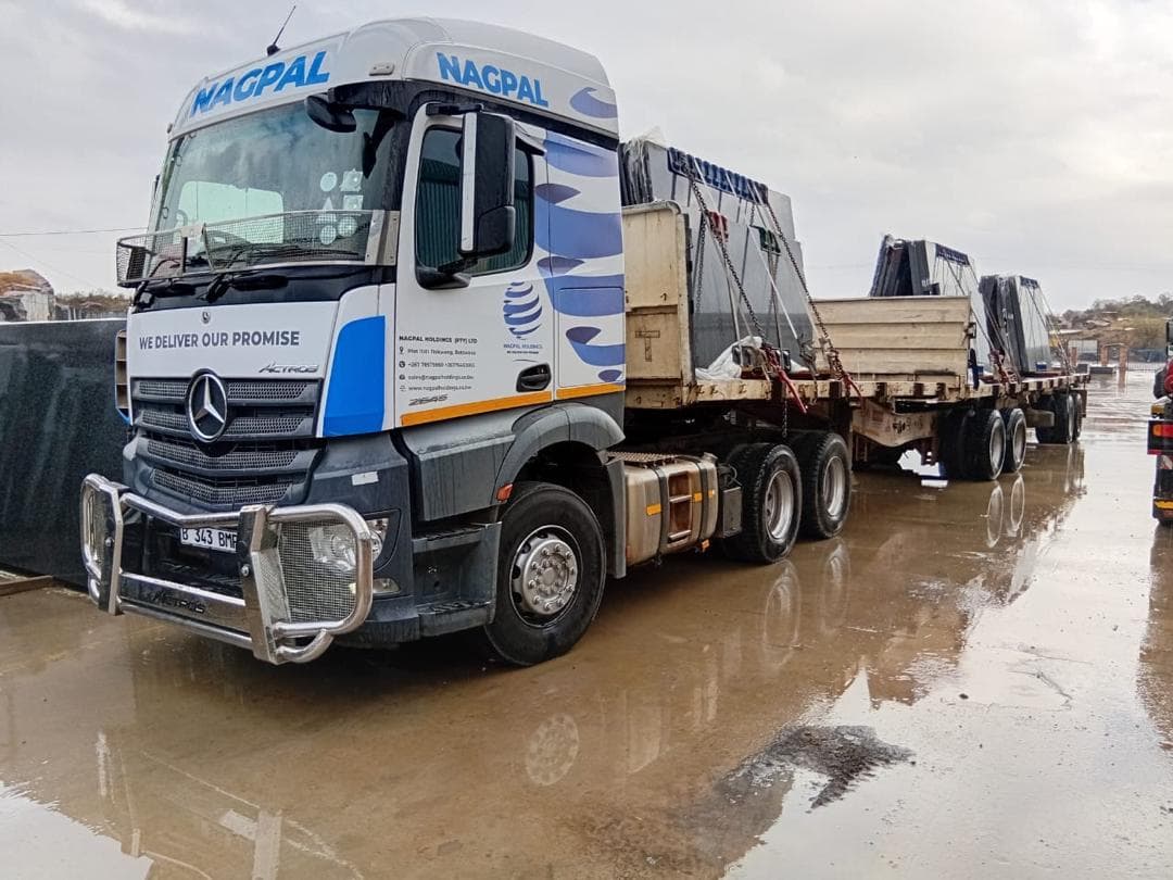 Nagpal Holdings branded truck and flat-deck trailer operating on a regional route